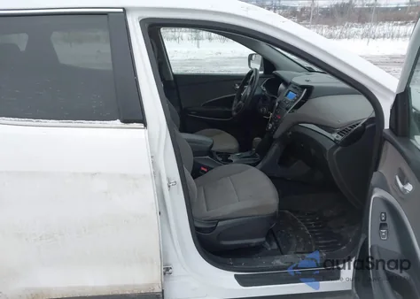 2015 Hyundai Santa Fe Sport 2.4L z USA, uszkodzony, nr VIN 5XYZTDLB0FG251428